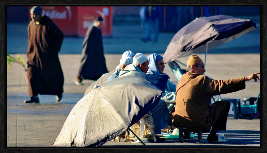 Main image Group of Berber men on Djeema El Fna Square, Marrakech-Medina, Photo taken by J.Schleenbecker, Copyright 2025
