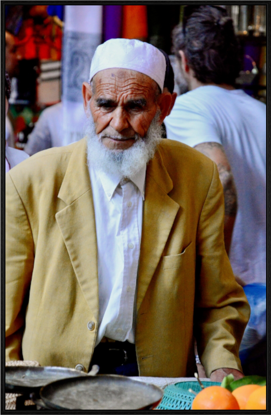 Main image Old Berber Man in the Souks of Marrakech; Photo Art Print on Acrylic glass; Oak wood frame