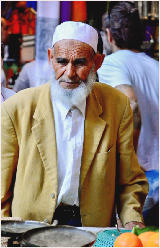Main image Old Berber Man in the Souks of Marrakech - Fine Art Photo Print under Acrylic Glass; Art Box Frame, White Maple Wood, 50 mm